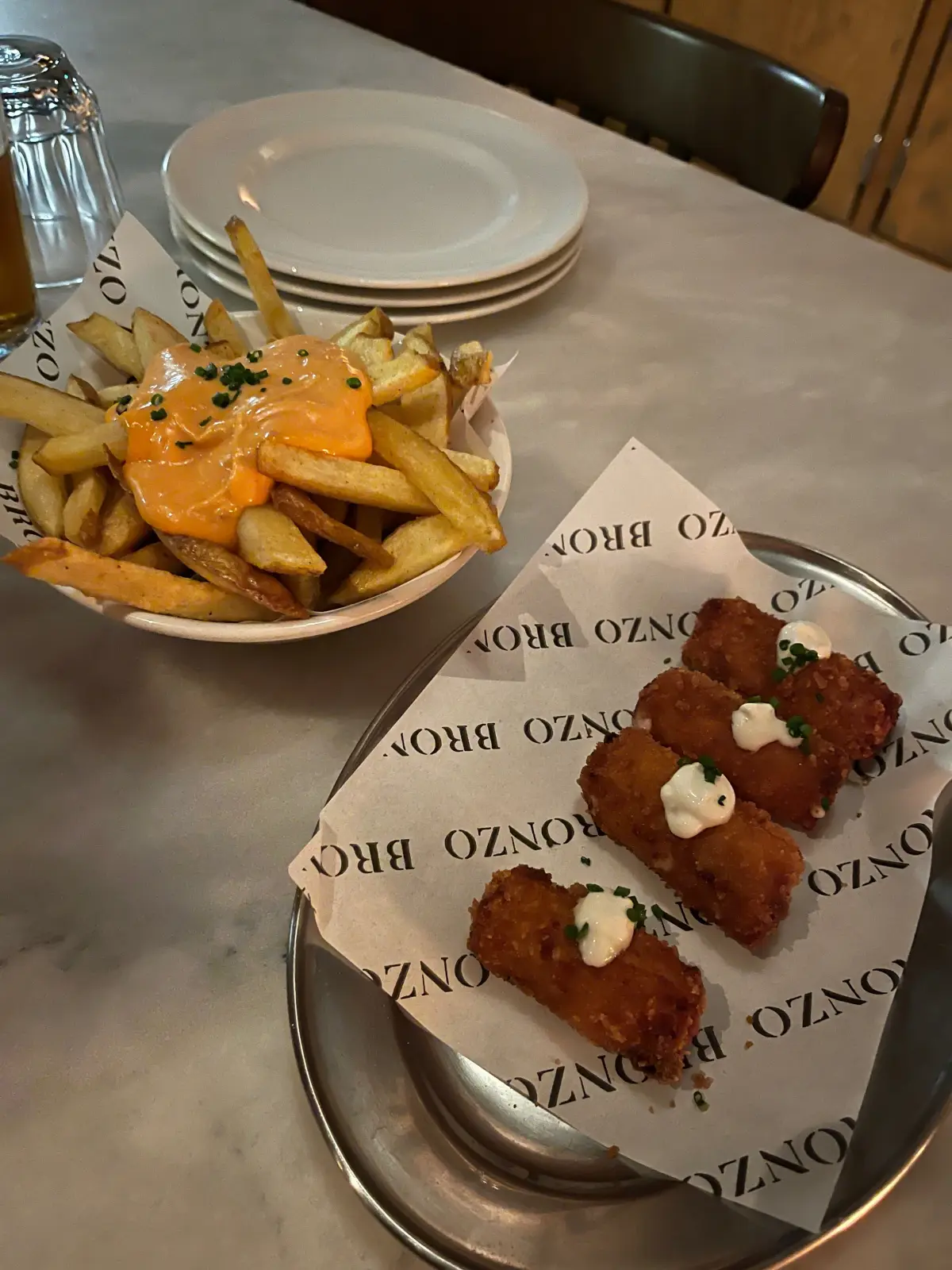 Fries with sauce and croquettes at Bronzo bar e cucina