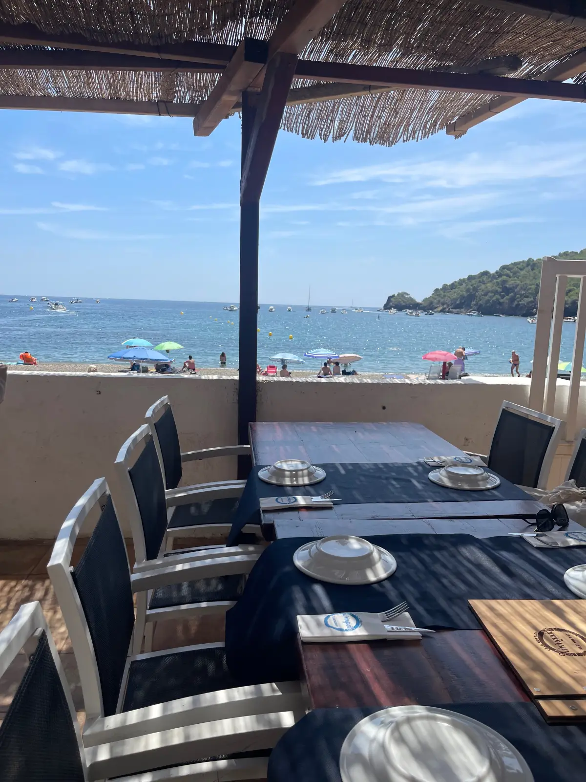 The shaded terrace overlooking the sea