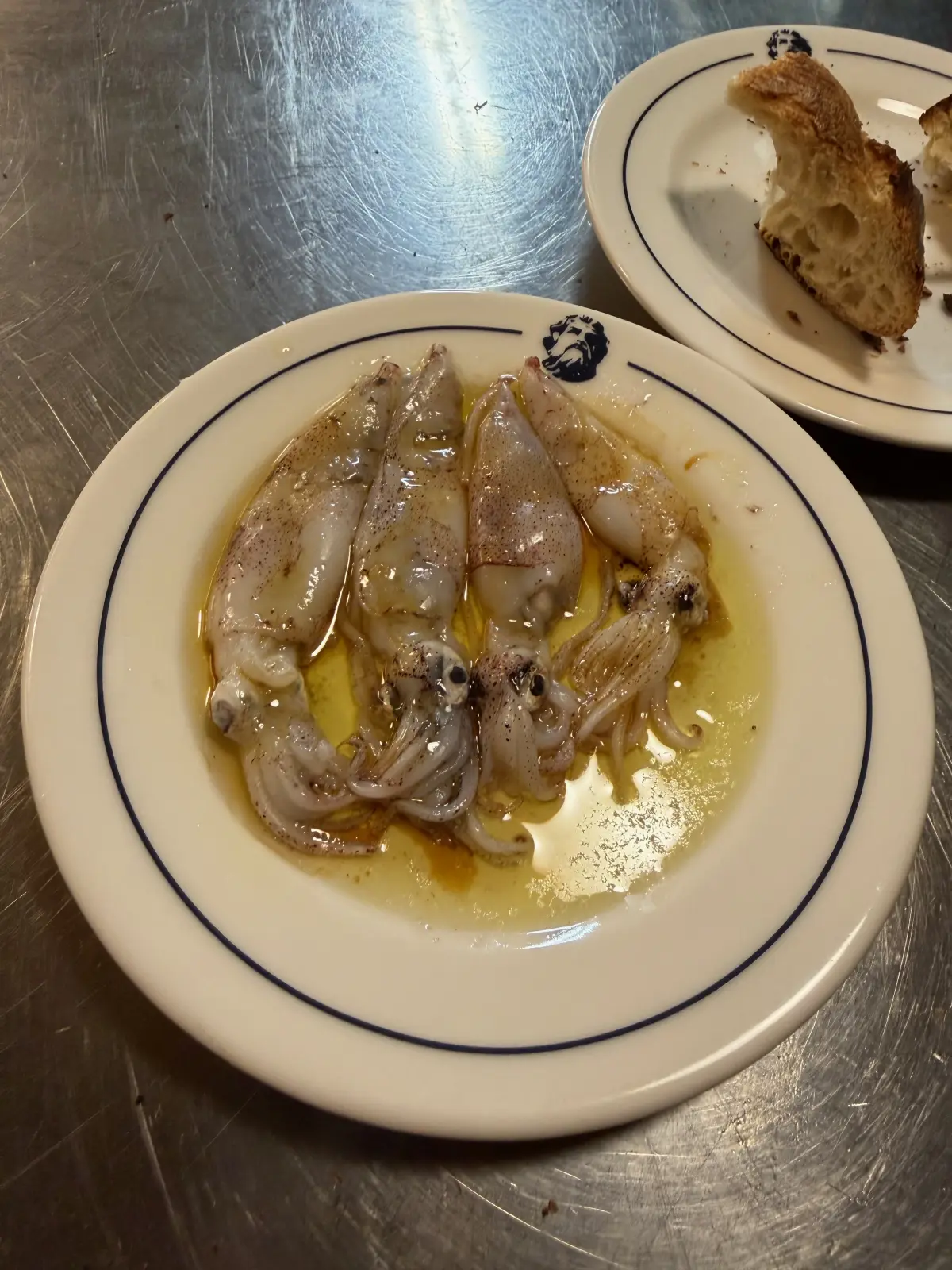Grilled baby squid at Ultramarinos Marín