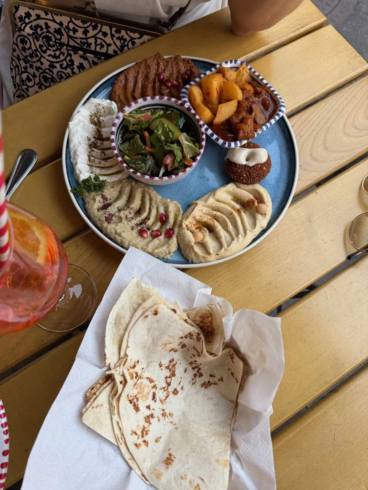 Sharing platter with grilled meat and rice at SimSim City in Zurich