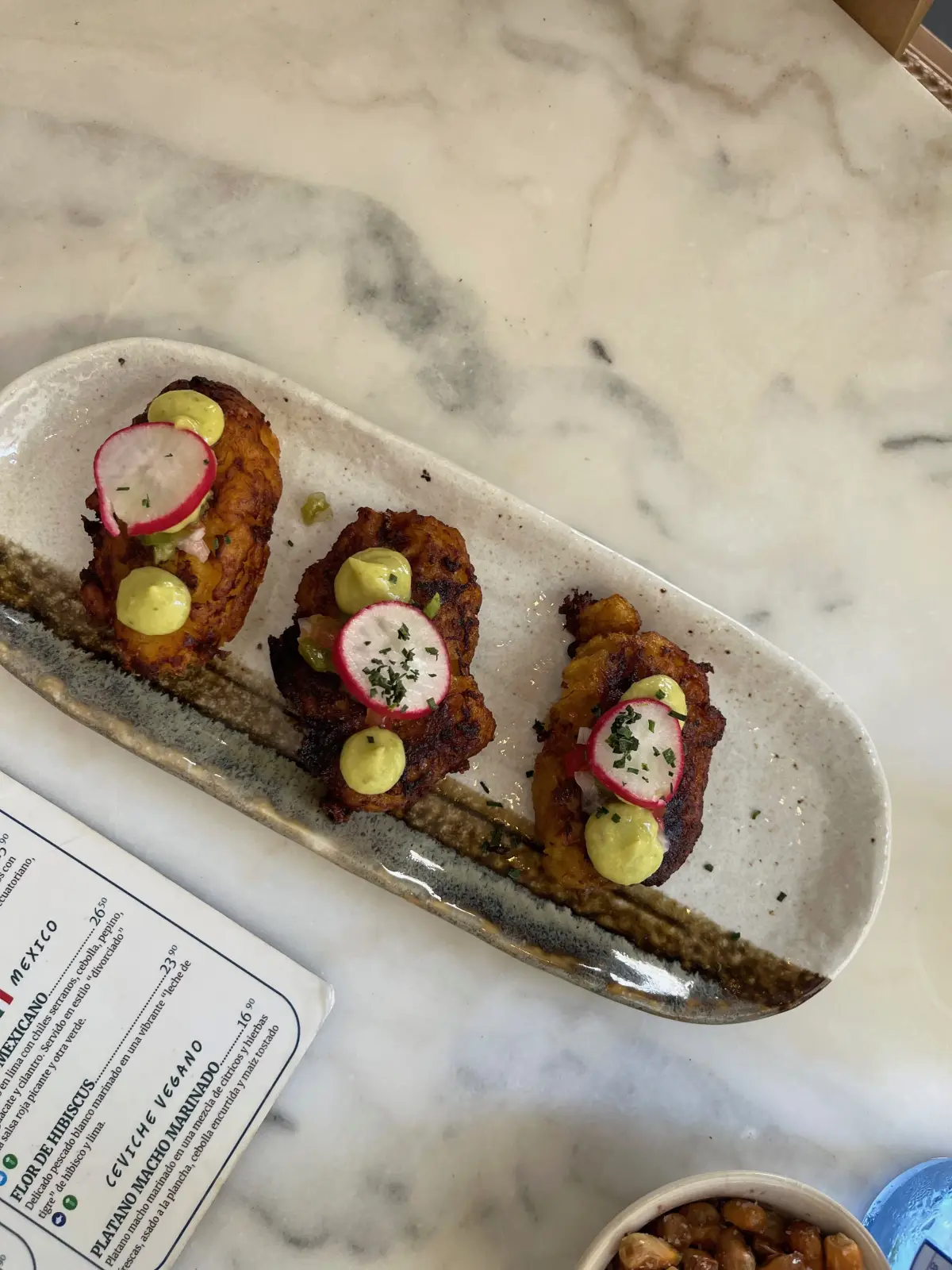 Plantain bites with radish and avocado cream at Sr. Ceviche
